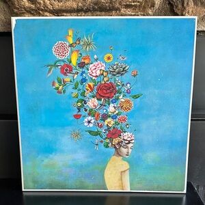 A Mindful Garden by Duy Huynh 
Floral Head Art Print on Blue Background